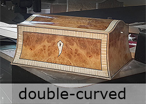 a double curved box veneered in burr oak and inlaid with ripple sycamore made on a smartBoxmaker box making course
